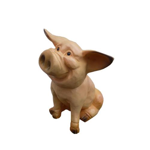 Garden decorative sculpture designed as a sitting pink smiling cartoon pig 38cm
