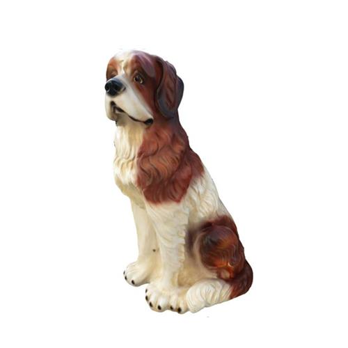 Decorative sculpture designed as an original motley white brown colored shaggy dog 75cm