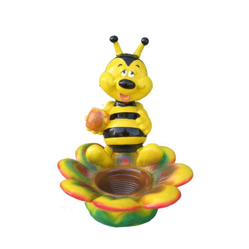 Decorative sculpture designed as a happy cartoon honey bee sitting on a flower 45cm