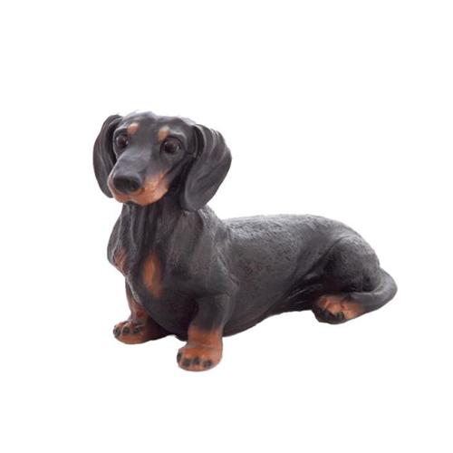 Decorative sculpture designed as a dark black colored standing dachshund dog 22cm