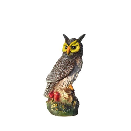 Decorative sculpture designed as a natural colored owl with yellow face 39cm