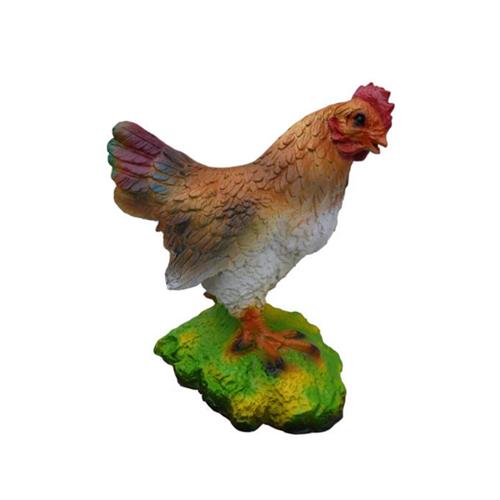 Decorative sculpture designed as a natural colored chicken on a grass 32cm