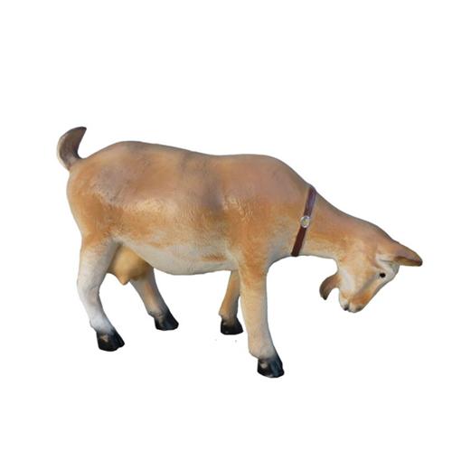 Decorative sculpture designed as a motley light brown white colored goat 52cm