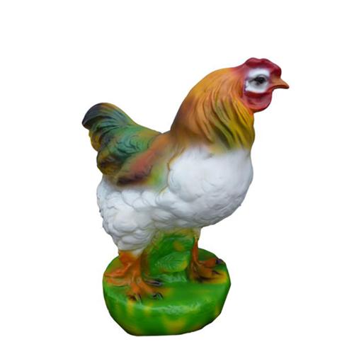 Decorative sculpture designed as a colorful standing rooster on grass 40cm