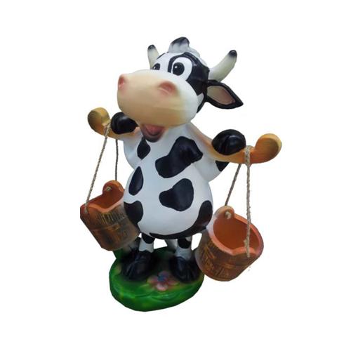 Decorative sculpture designed as a motley cow with two buckets on a stick 55cm