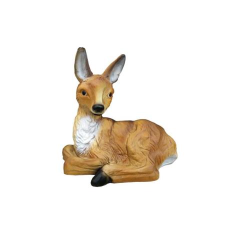 Decorative sculpture designed as a motley light brown white colored resting fawn 35cm