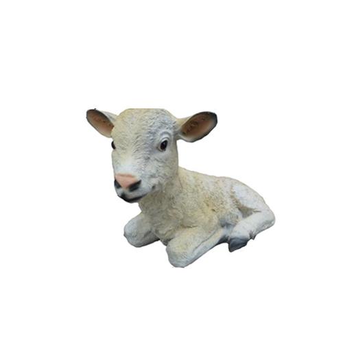 Decorative sculpture designed as a beige lying calf 40cm
