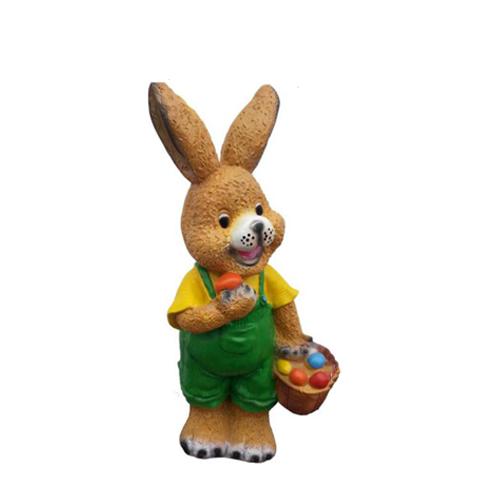 Deco figure of a light brown standing bunny in a green pants with a basket of easter eggs 41cm