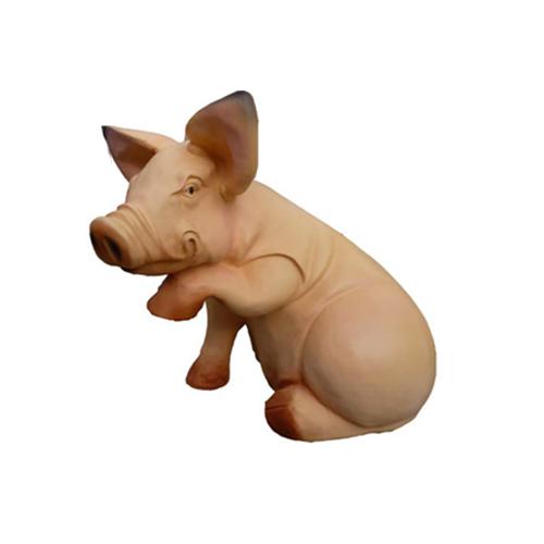 Light pink colored deco figure of an angry cartoon sitting pig 46cm