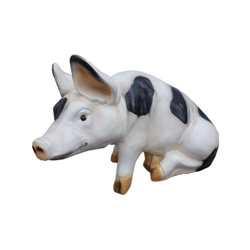 Motley white black colored deco figure of a sitting pig 38cm