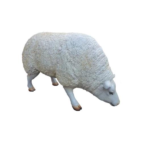 Full white colored deco figure of a shaggy standing eating sheep 42cm