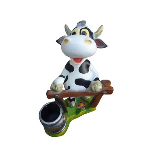 Cartoon colorful deco figure of a motley cow gardener with a fence & a bucket 54cm