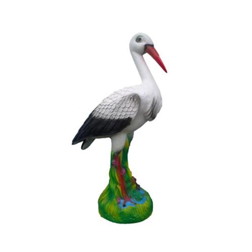 Natural colored decorative garden sculpture designed as a stork on the grass 80cm