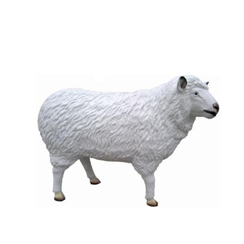 Decorative garden sculpture designed as white colored sheep figure Decorative garden sculpture designed as white colored sheep figure