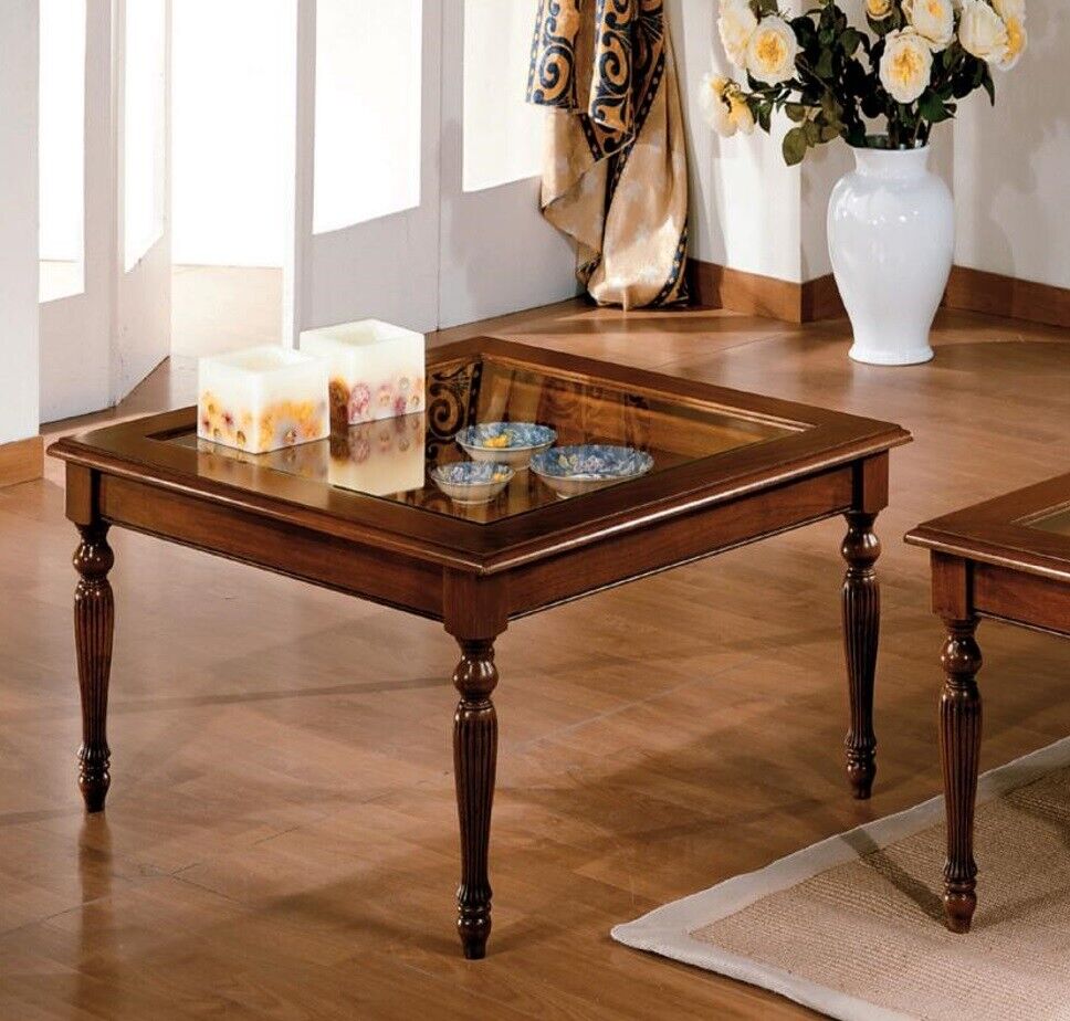 Classic coffee table Classic wooden coffee table with glass