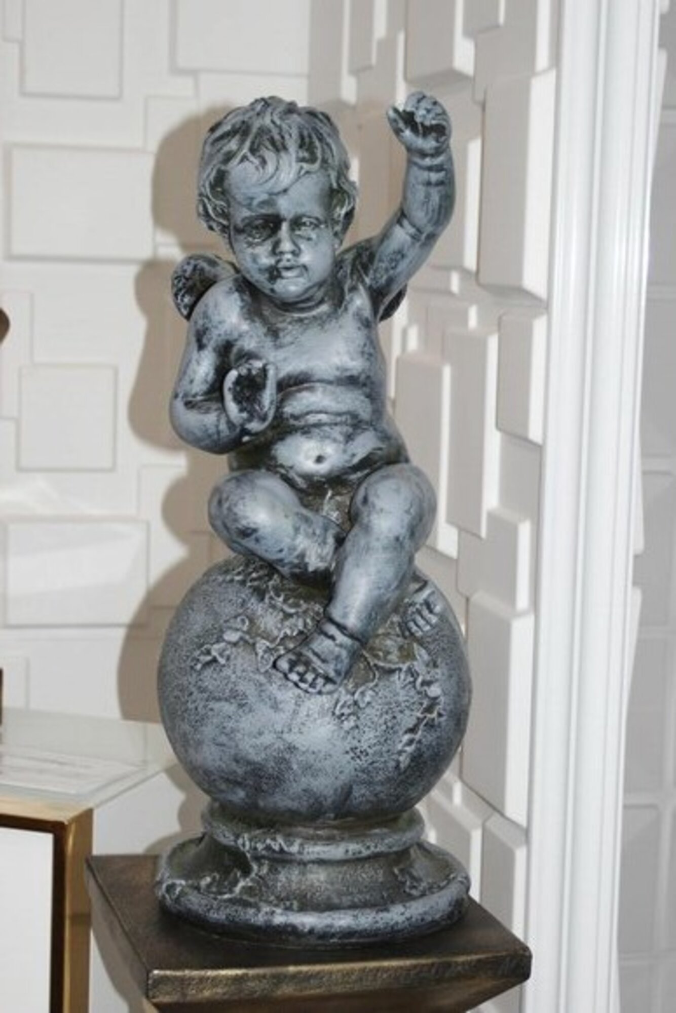 Angel figure on globe sculpture stature figures sculptures statues On Stock