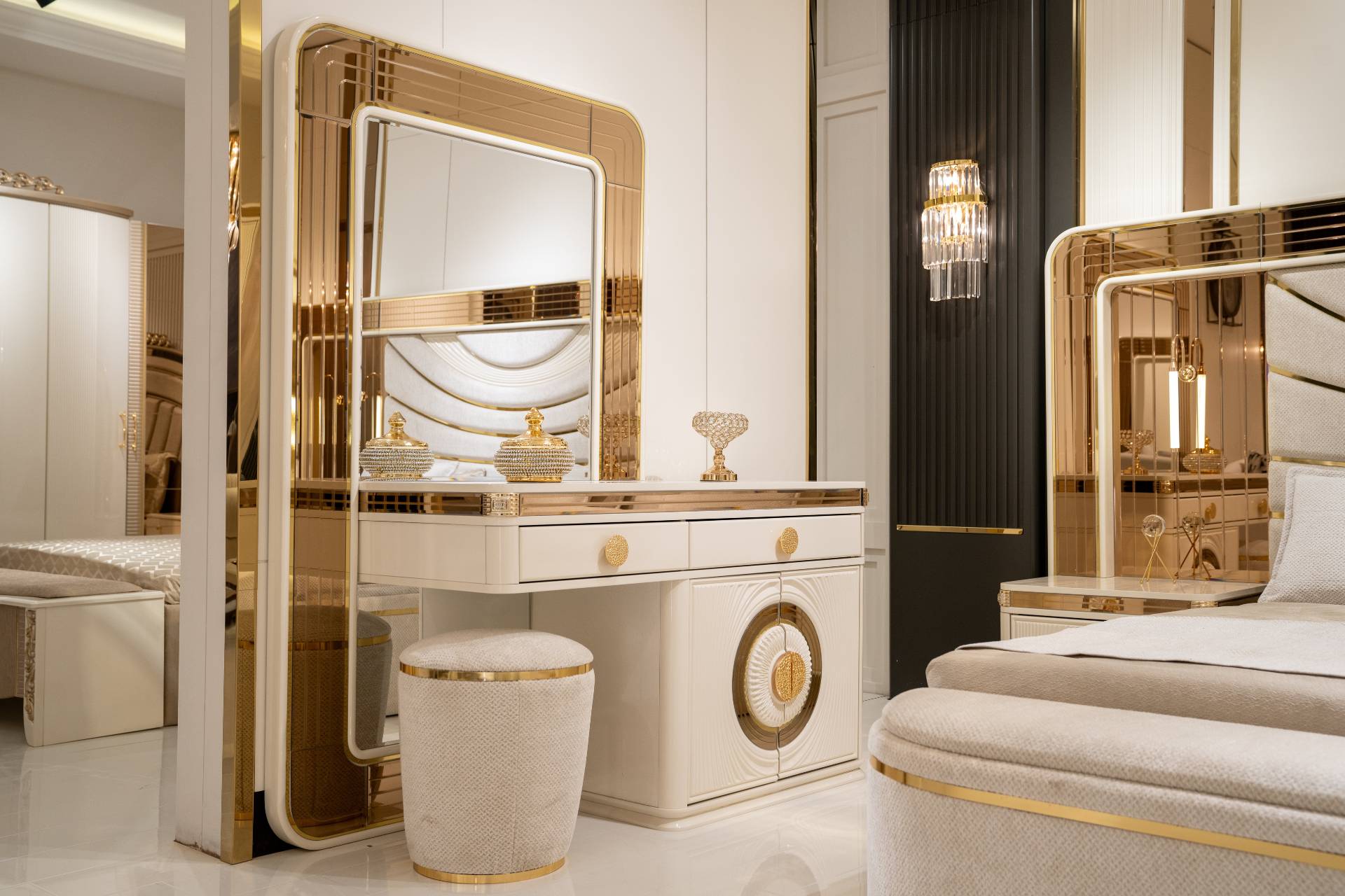 Elegant beige wooden vanity table with mirror and stool.