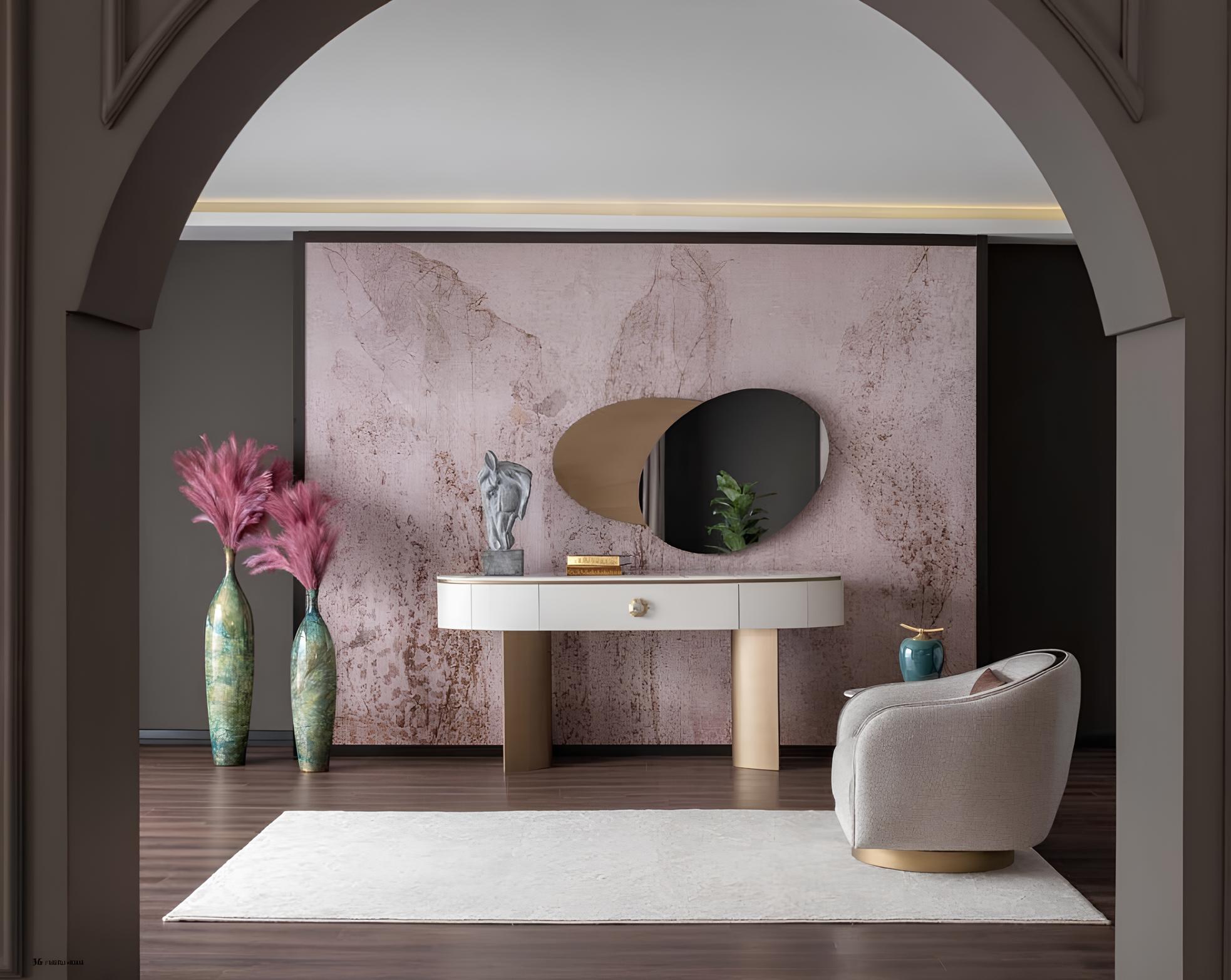 Dining room set with console table, mirror, and elegant armchair.