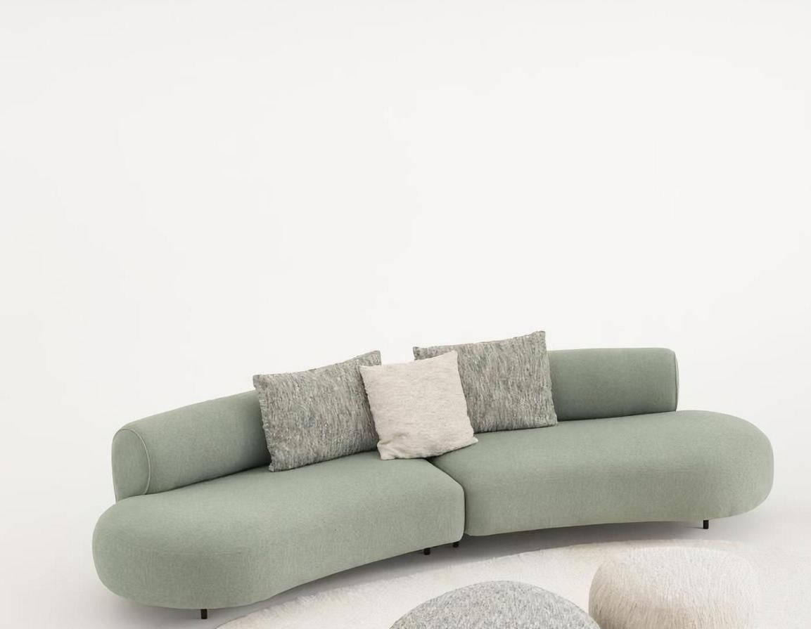Elegant green fabric sofa for the living room in a modern style.