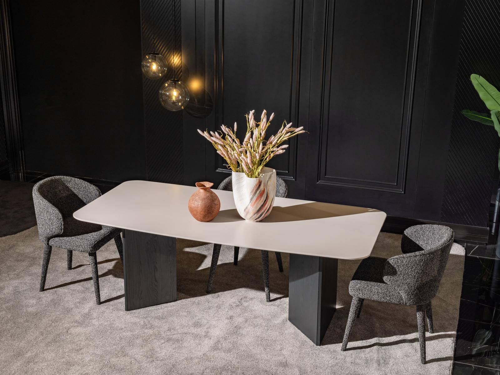 Elegant beige dining room set made of wood and textile with a modern design.