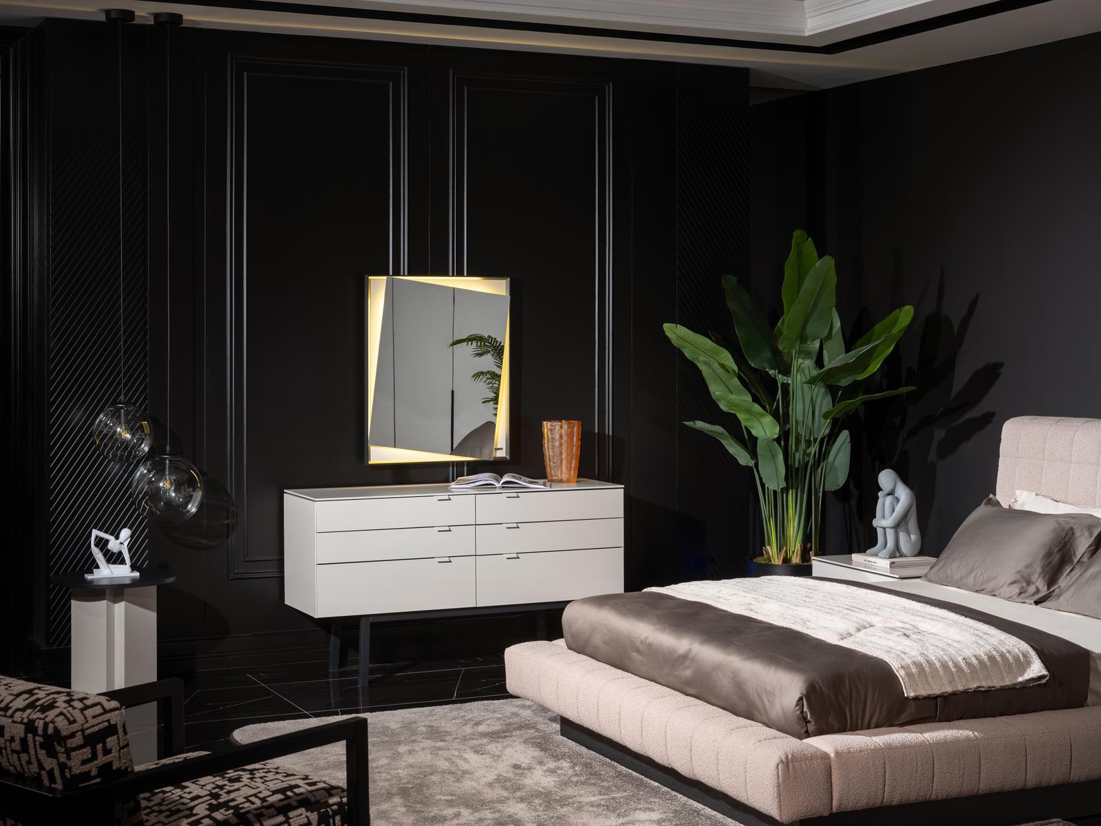 Elegant white makeup table with mirror made of wood for the bedroom.