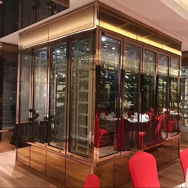 Elegant wine cabinet made of stainless steel in gold modern luxury design
