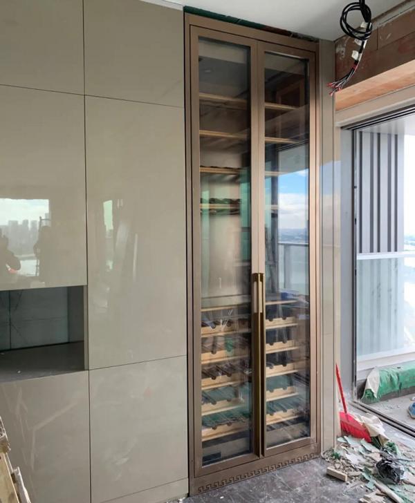 Golden stainless steel wine cabinet with dual zone temperature control