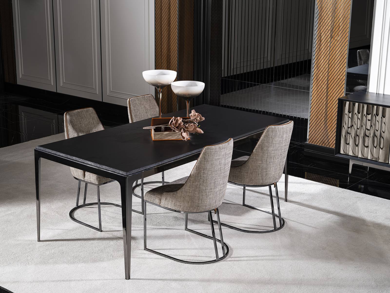 Elegant black wooden dining table in a modern style.