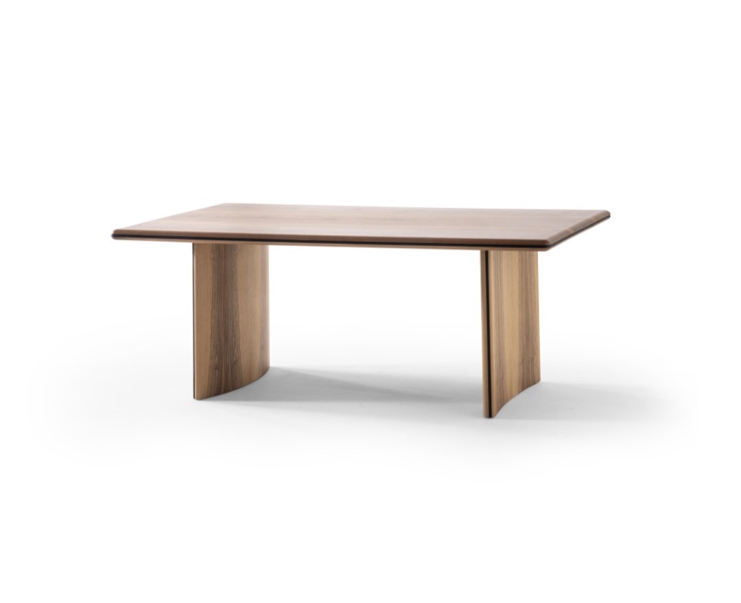 Elegant brown wooden dining table for a modern dining room.