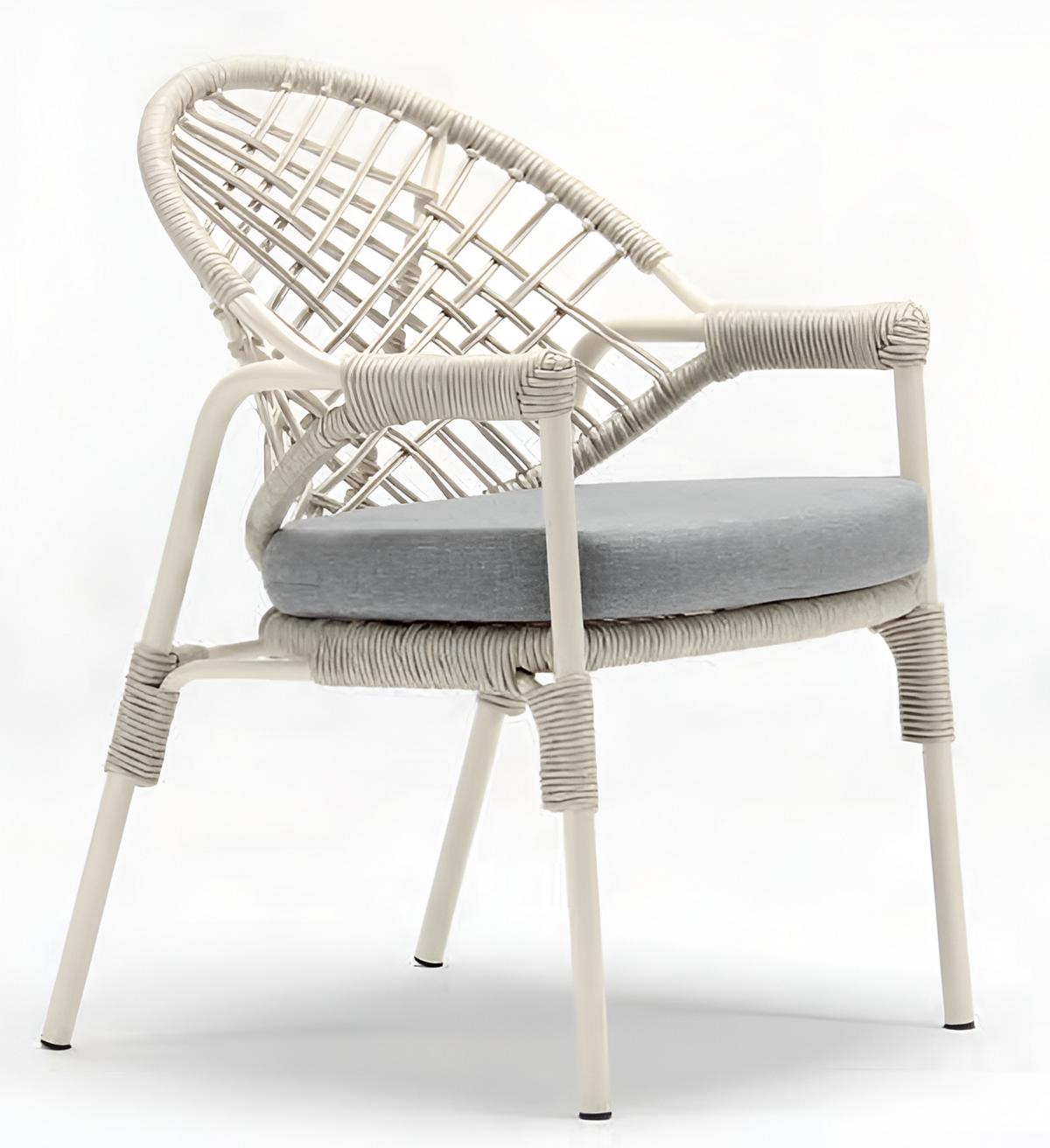 White wicker armchair with armrests or rattan armchair with seat cushion