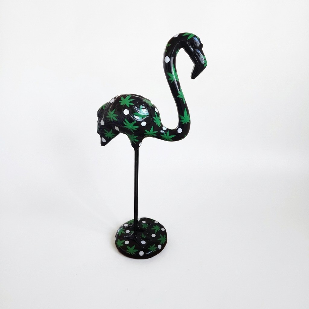 Abstract decorative sculpture designed as a gloss black colored flamingo with plants patterns 119cm