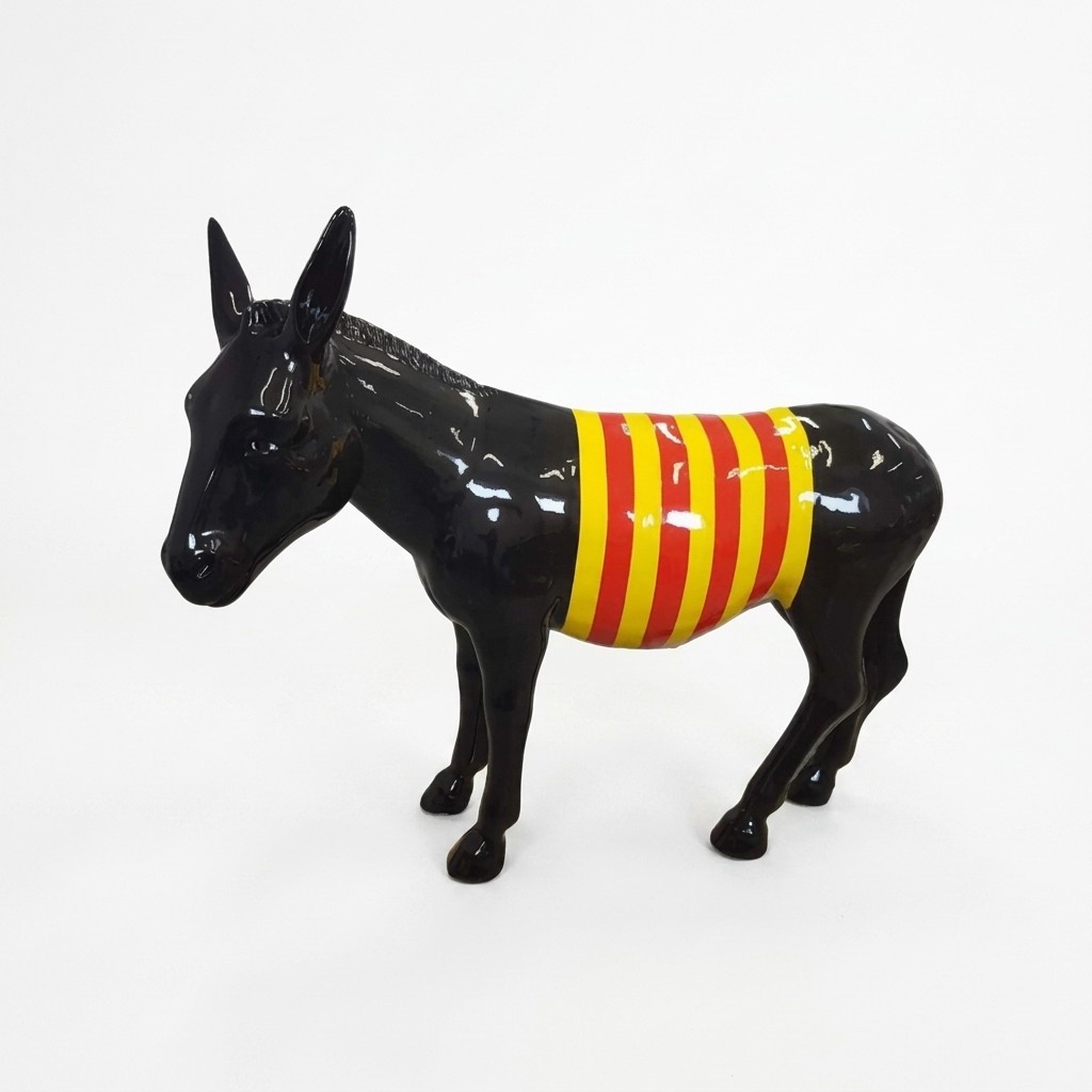 Abstract decorative gloss sculpture designed as a standing black donkey with black yellow stripes 145x174cm