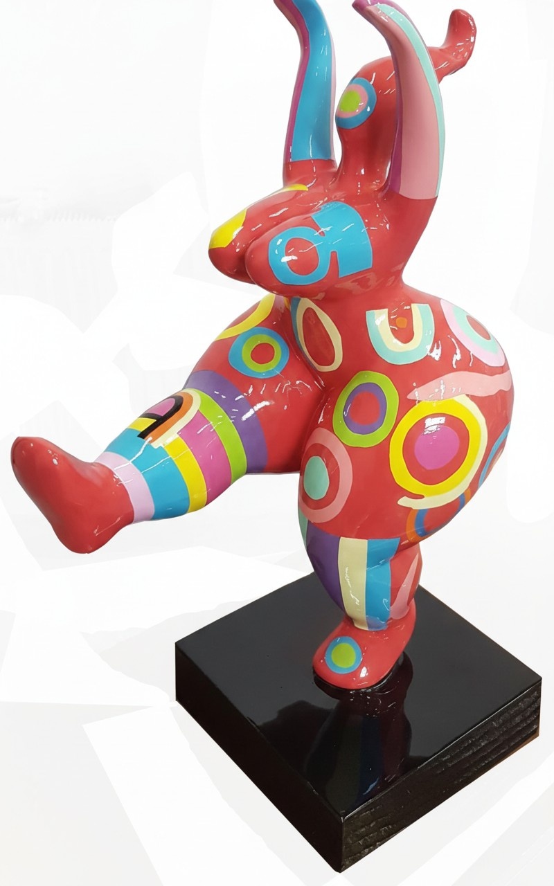 Gloss massive abstract decorative sculpture designed as a standing pink figure in colorful patterns 50cm