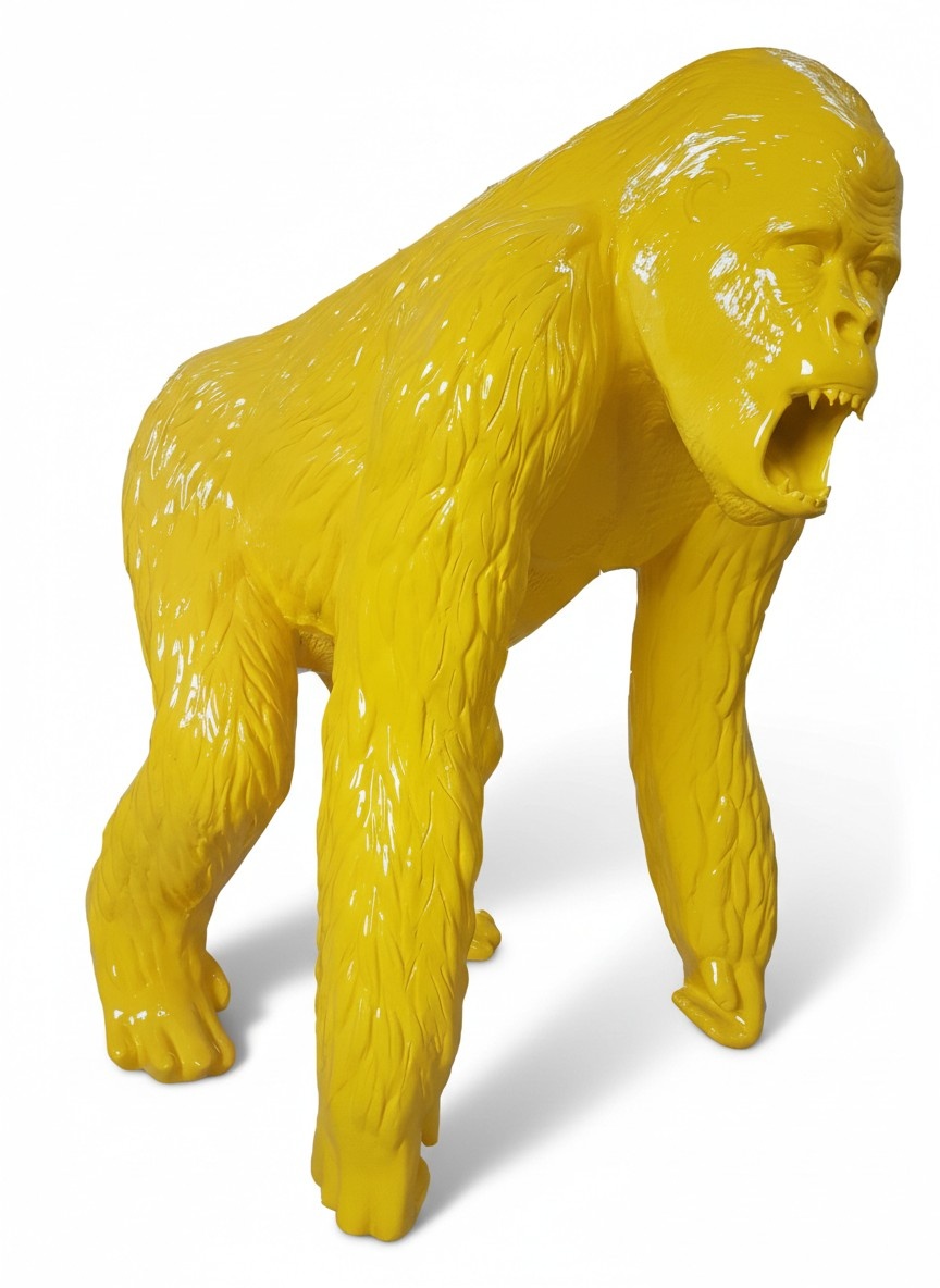 Decorative abstract sculpture designed as a gloss full yellow colored shouting gorilla 130cm