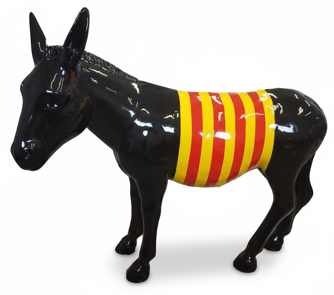 Abstract decorative sculpture designed as black gloss colored donkey with red yellow stripes 145cm