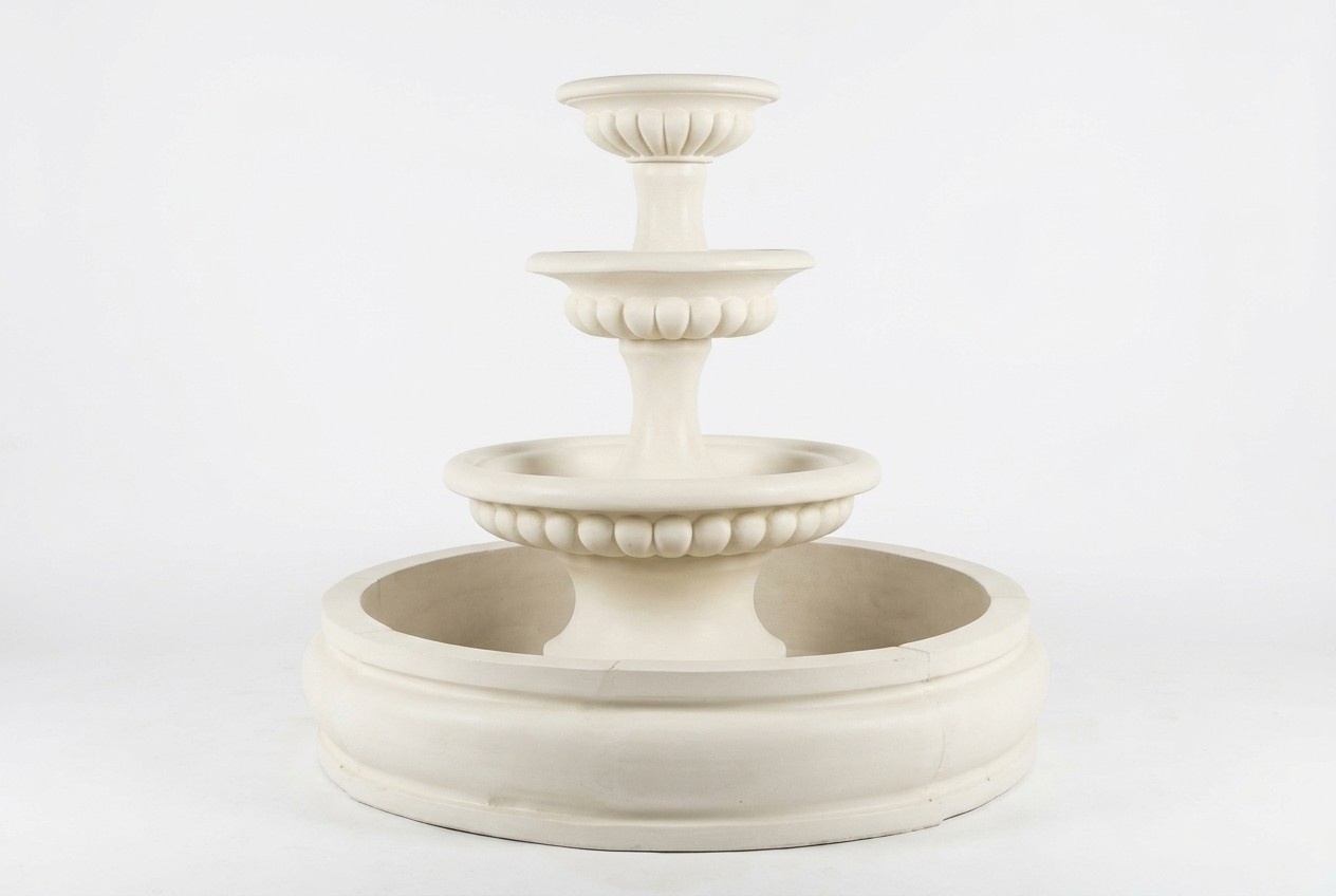 Decorative garden pond fountain consists of four round bowls made of weather-resistant cement