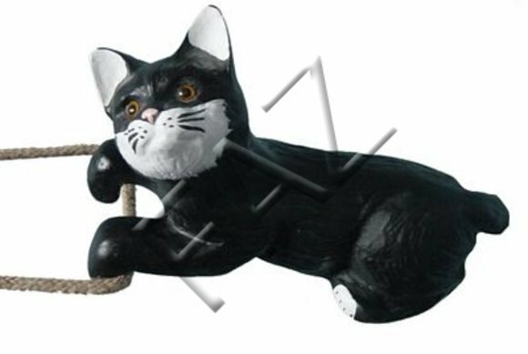 Decorative sculpture designed as lying motley black white colored kitty 15x29cm C346