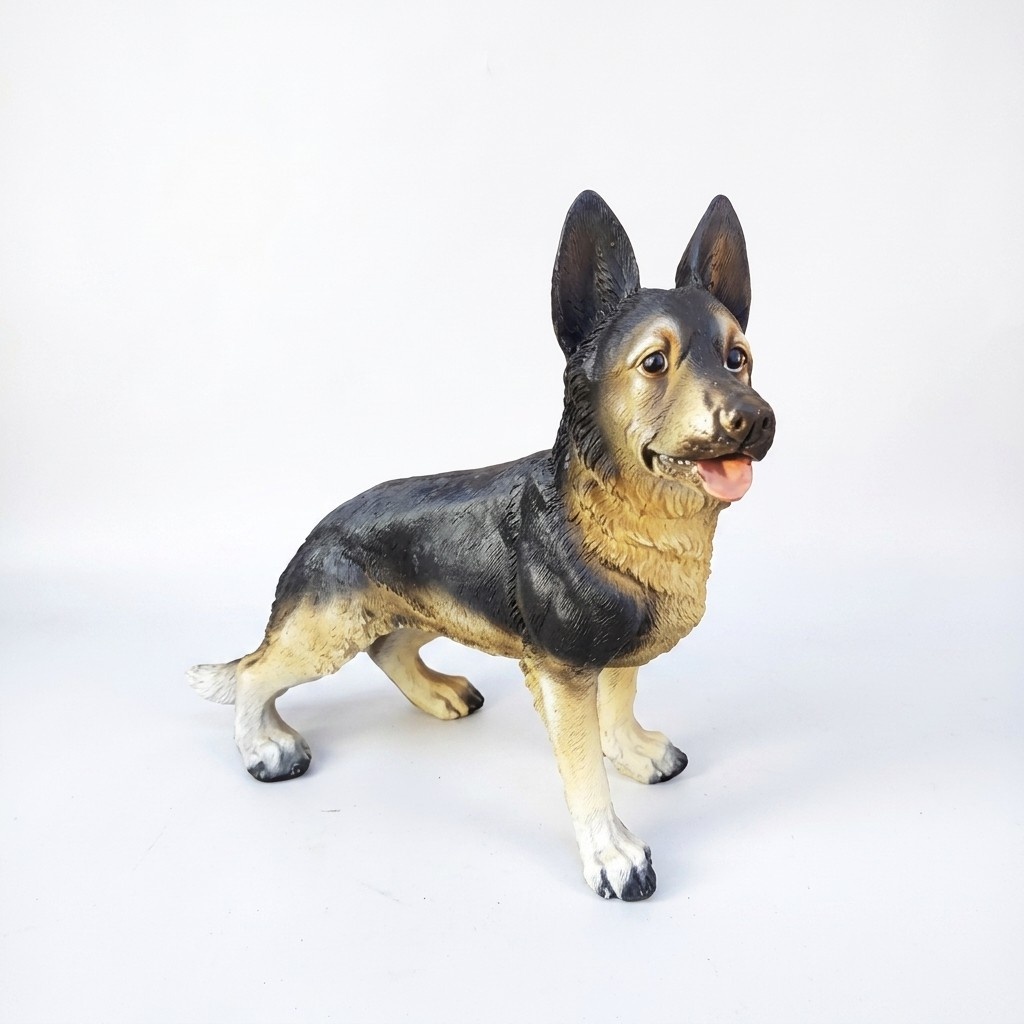 Motley in dark tones colored decorative sculpture of stanning german shepherd puppy 24x32cm (A602)