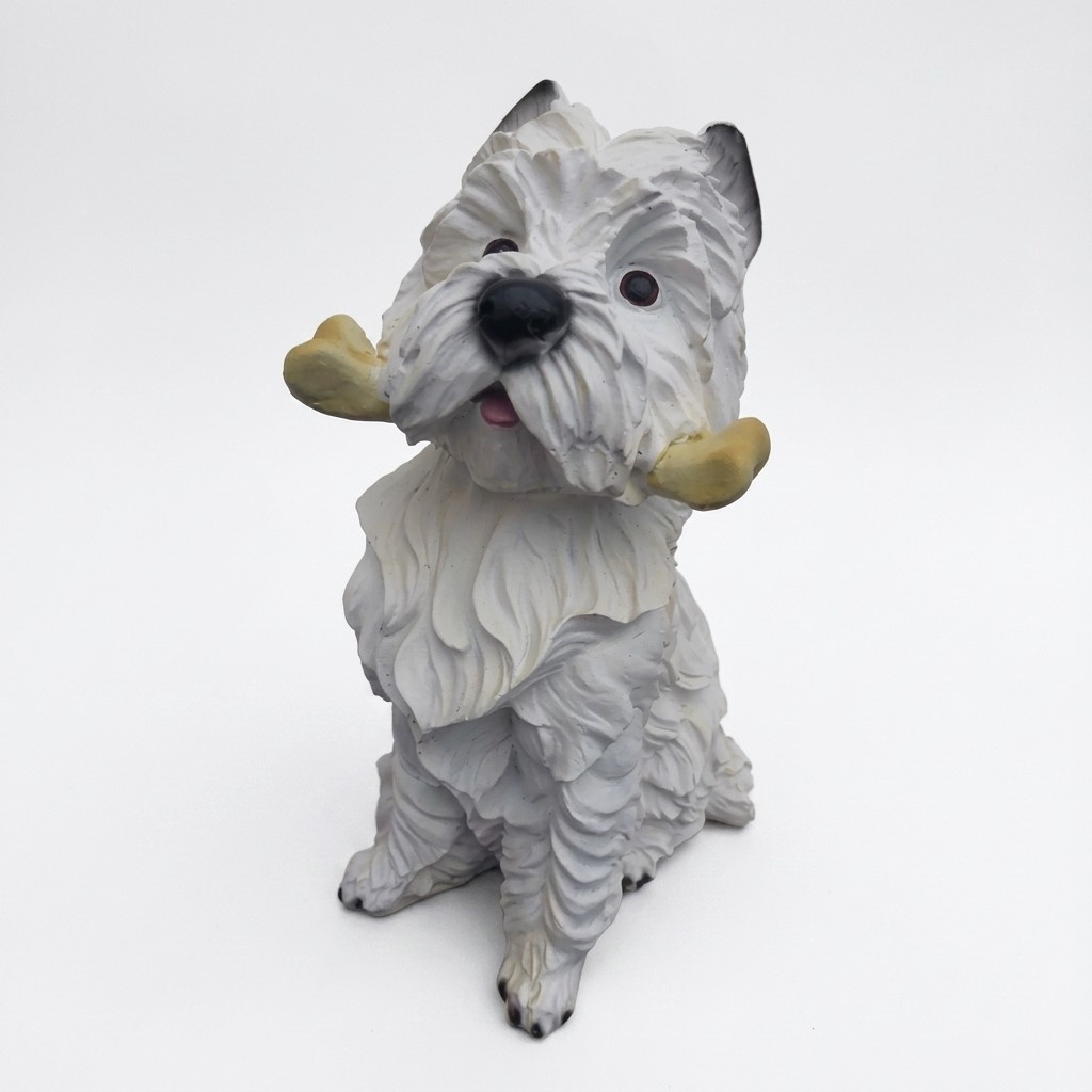 Decorative sculpture designed as a sitting white puppy with a bone 42 cm (A417)