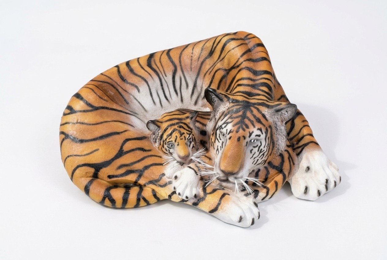 Decorative sculpture designed as an original colored resting tigress with tiger cub 40x110x100cm