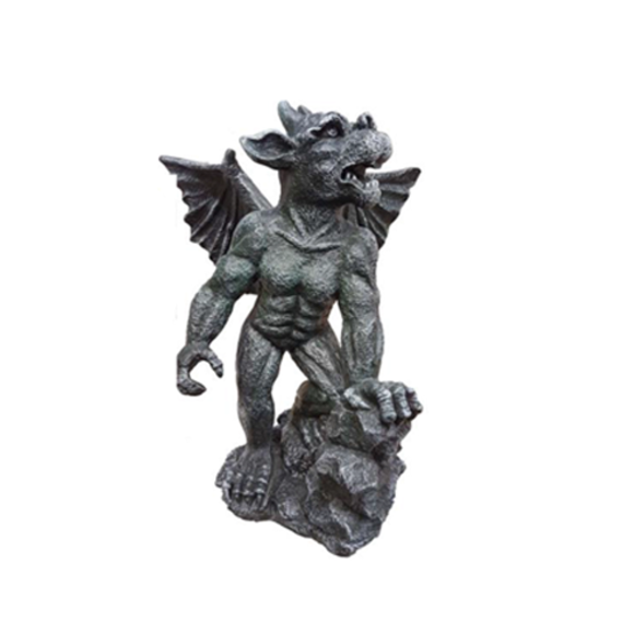 Decorative sculpture designed as a dark grey colored dragon goblin on a stone 54cm G23