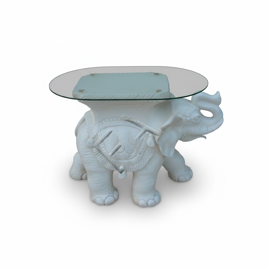 Oval glass coffee table with an white colored elephant figure 45cm