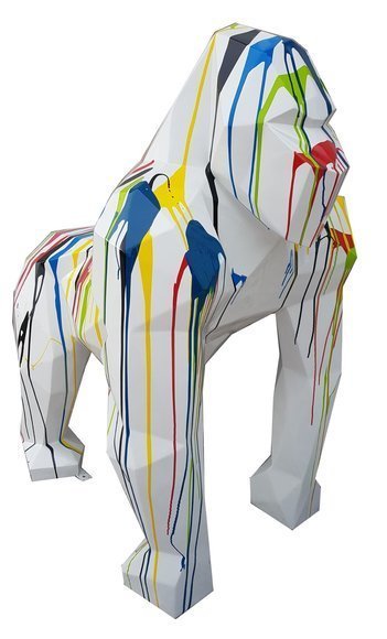 Abstract decorative sculpture designed as a white colored geometric gorilla with colorful stripes 128cm