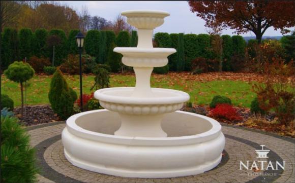 Decorative garden pond fountain consists of four round bowls made of weather-resistant cement