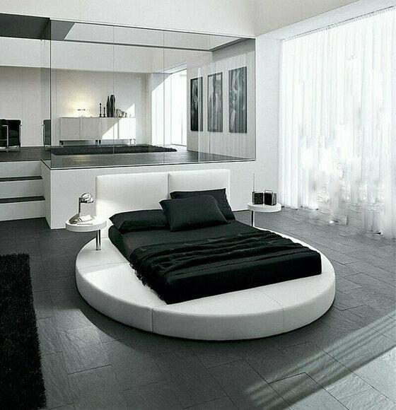 Leather upholstered massive round double bed in modern style for marriage couple made of real wooden frame