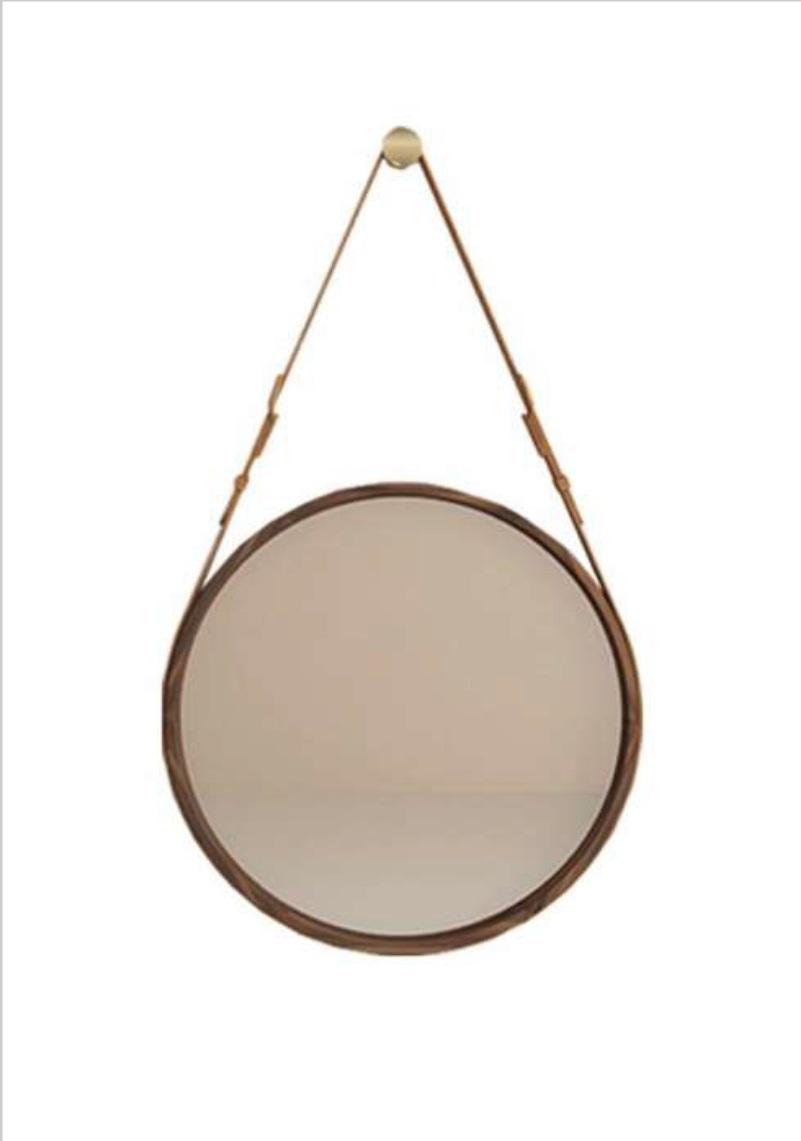 Framed wall mirror with a luxurious brown frame made of natural walnut wood.