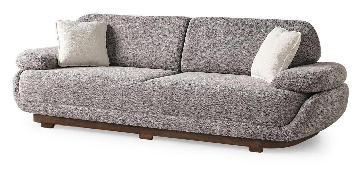 Gray three-seater sofa upholstered furniture modern design textile furnishings