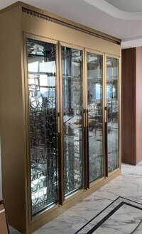 Golden stainless steel wine cabinet in modern luxury style