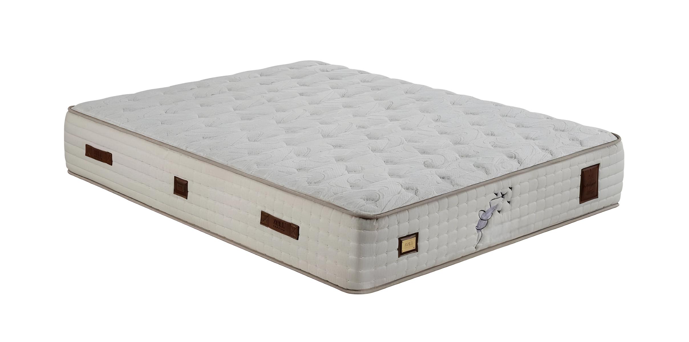 White comfort mattress made of textile for the bedroom.