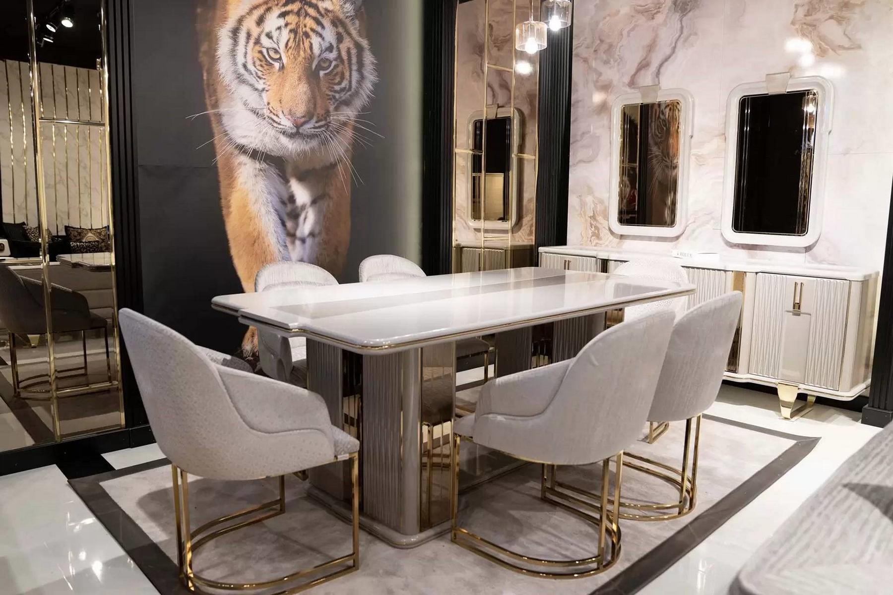 White dining table and chair set made of wood, modern and elegant.